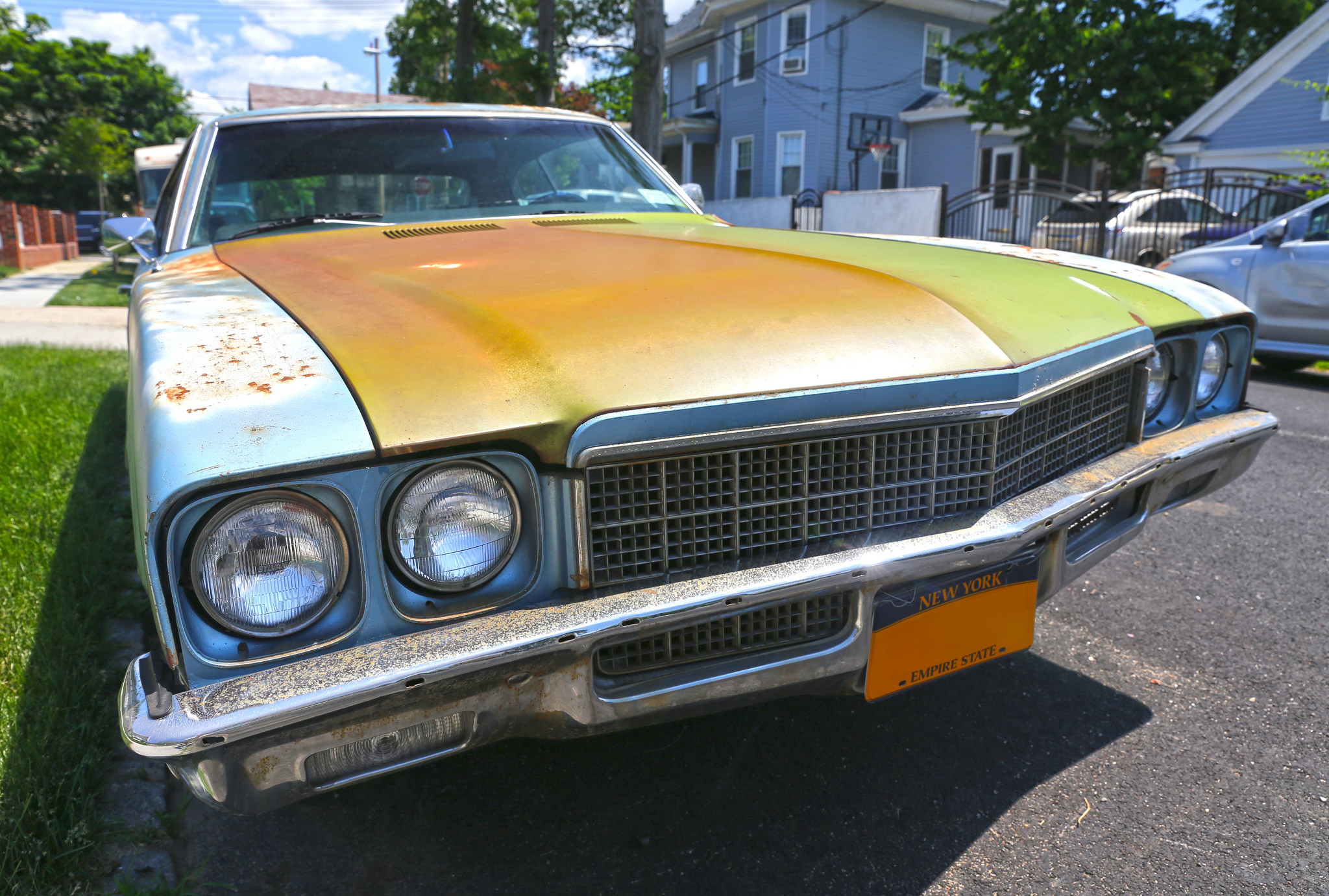 A two-door hardtop coupe with the base two-barrel 350 V8. Built in Framingham, MA. Nice mismatched body panels, a flat tire and just the right amount of surface rust. Sinister and dumpy, all at the same time.