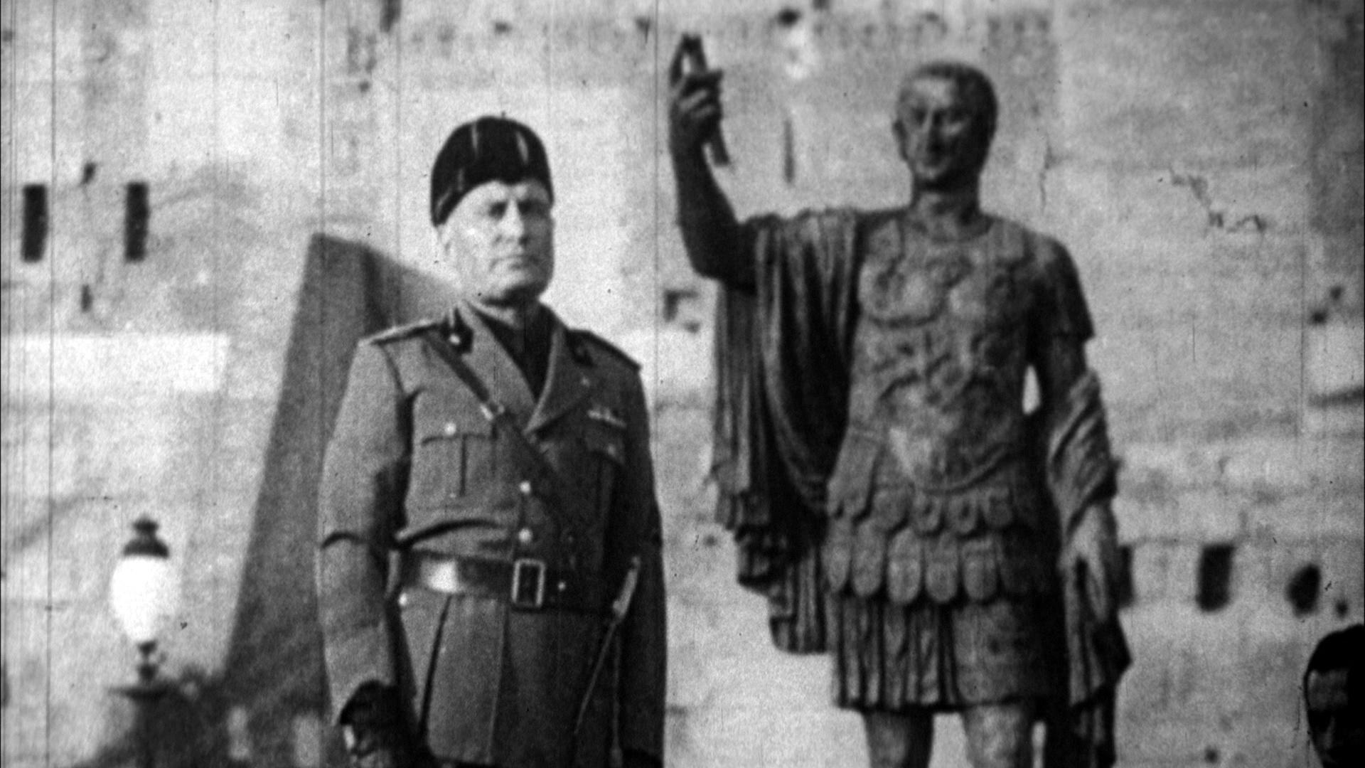 Mussolini near roman statue - black and white image