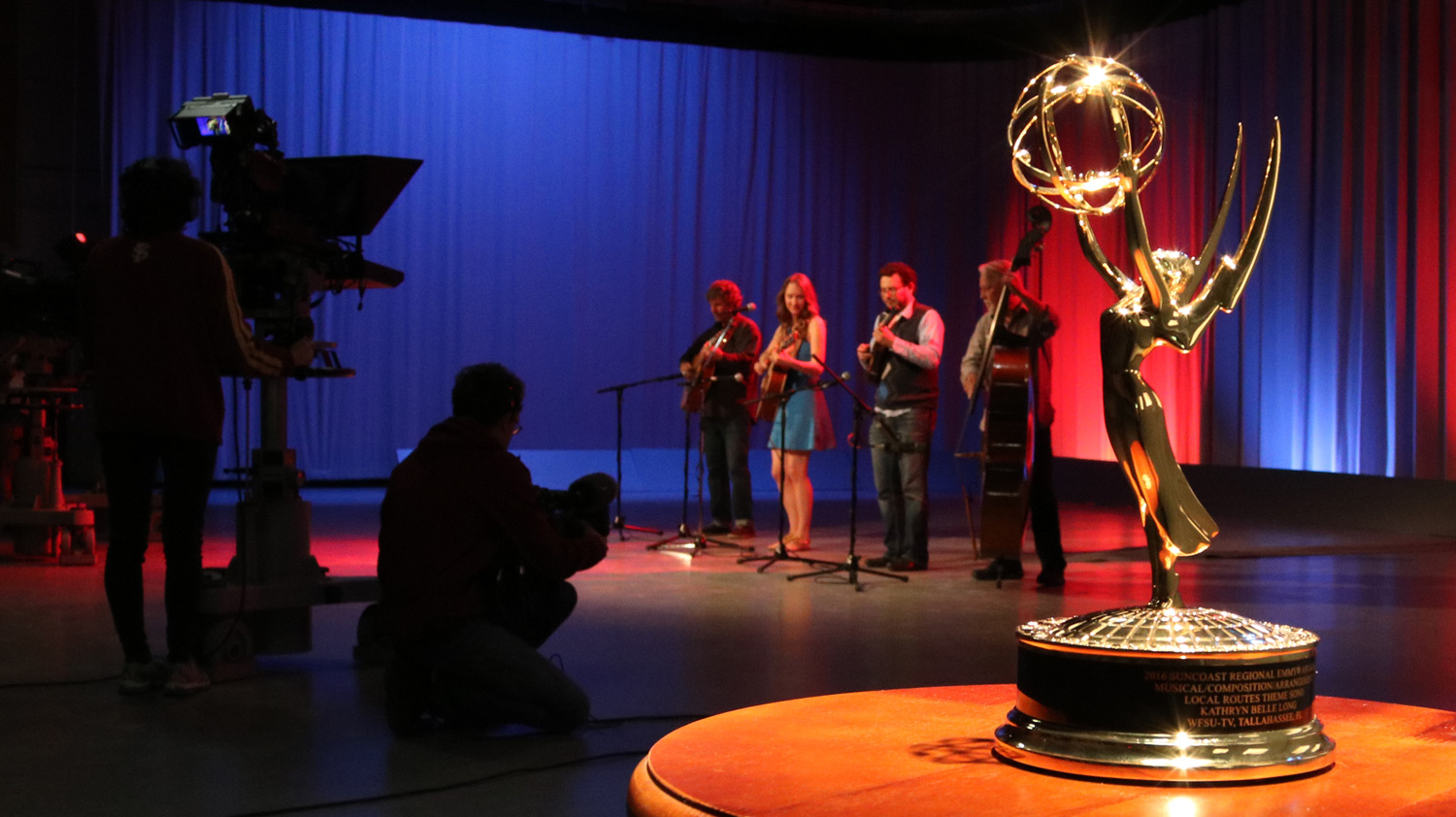 Belle and the Band performing in WFSU's Studio A, behind the Local Routes Suncoast Regional Emmy.