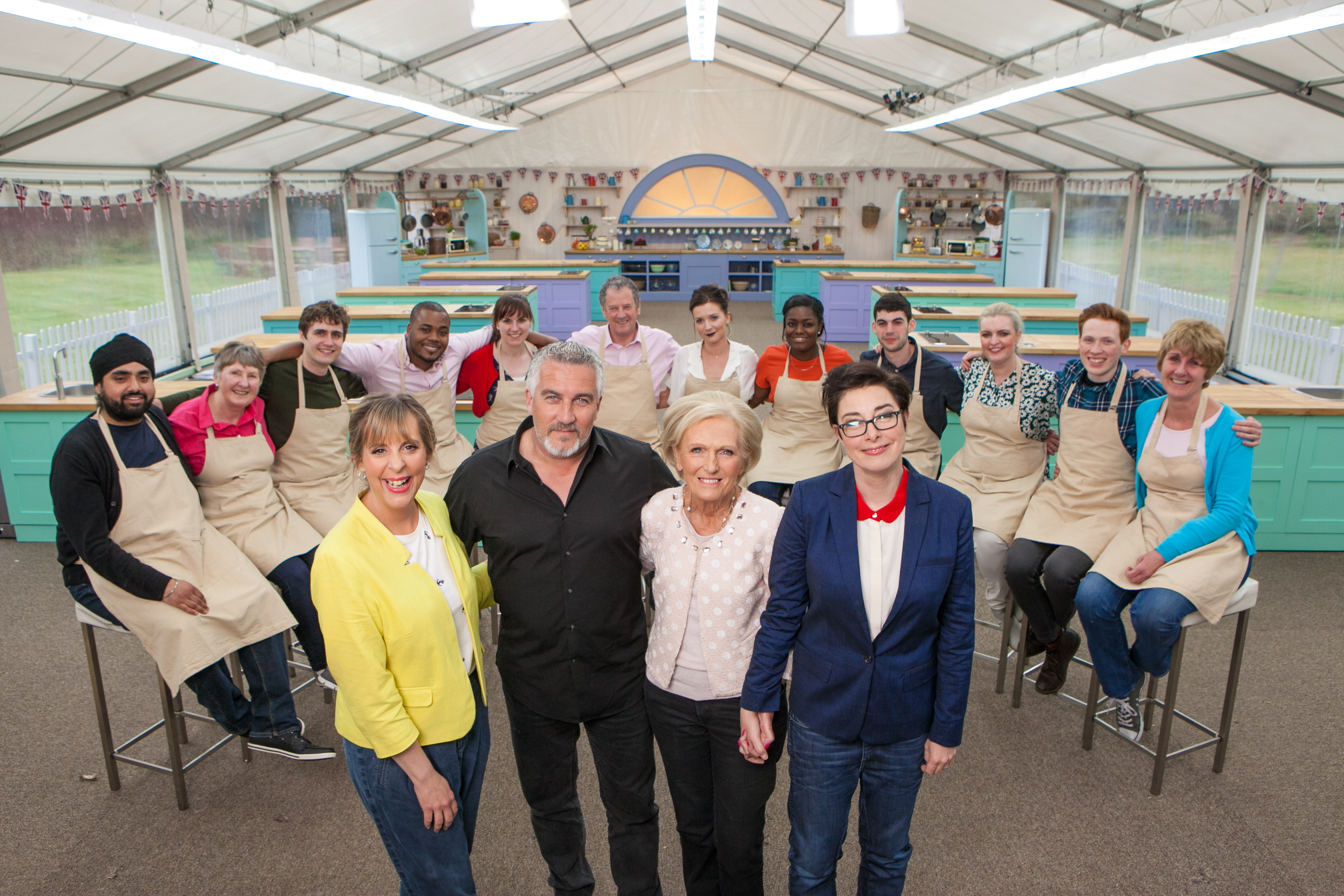 season 4 contestants sitting together with hosts in front of them